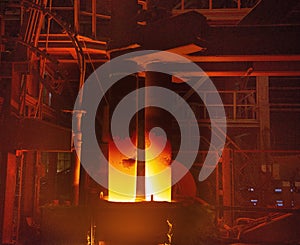 Steel production in electric furnaces. Sparks of molten steel. Electric arc furnace shop . Metallurgical production, heavy