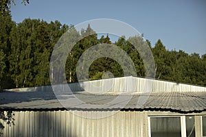 Steel profile building. Roof of production hall. Warehouse building outside