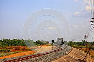 Steel rails are the routes of train travel.  In rural Thailand  Natural background