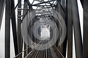 Steel railway bridge in black and white