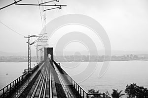 Steel railway bridge in black and white