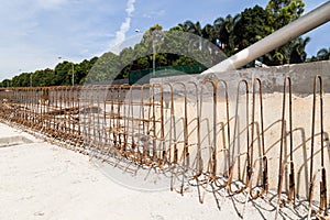 Steel rebar and concrete divider being constructed at construction site