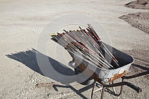 Steel rebar in a wheelbarrow