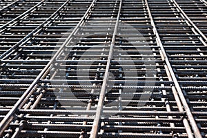 Steel Rebars for reinforced concrete construction site. Piled iron reinforcement workpieces photo