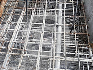 Steel reinforcement bar and timber formworks at the construction site.