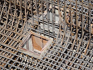 Steel reinforcement bar and timber formworks at the construction site.