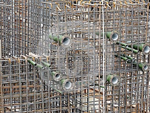 Steel reinforcement bar and timber formworks at the construction site.