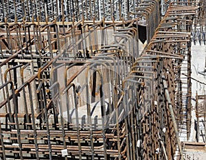 Steel reinforcement bar and timber formworks at the construction site.