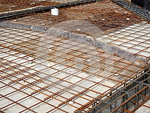 Steel reinforcement bar and timber formworks at the construction site.