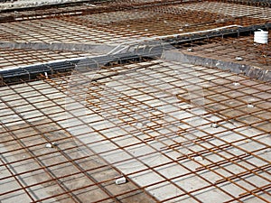 Steel reinforcement bar and timber formworks at the construction site.