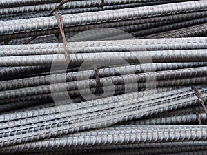 Steel rods or bars used to reinforce concrete