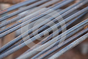 Steel rods or bars used to reinforce concrete