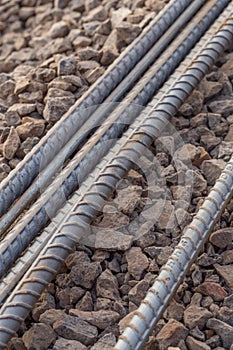 Steel rods or bars used to reinforce concrete