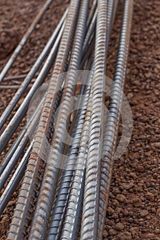 Steel rods or bars used to reinforce concrete