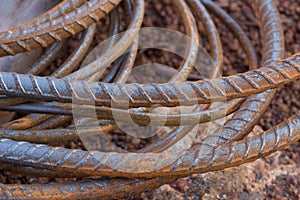 Steel rods or bars used to reinforce concrete