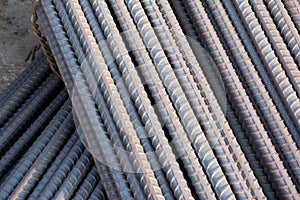 Steel rods or bars used to reinforce concrete.