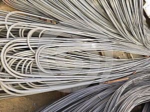Steel rods or bars used to reinforce concrete, in warehouse