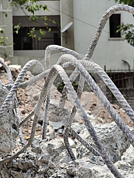 Steel rods or bars used to reinforce concrete, in warehouse.