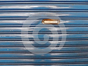 Steel roll up door with mailbox