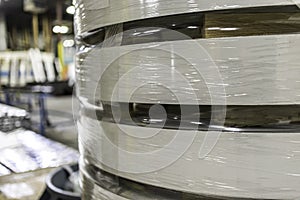 Steel rolls on roofing factory shop floor