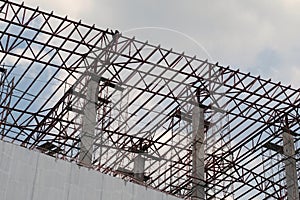 Steel roof structure of the building under construction