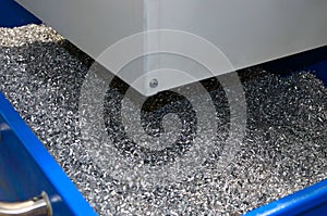 Steel scrap materials recycling. Abstract, background and texture of metal shavings. Aluminum chip waste