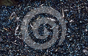 Steel scrap materials recycling background of metal shavings