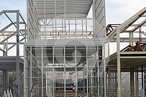 The steel skeleton of the newly built production hall .