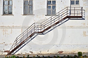 Steel staircase to wall of old house that is being renovated