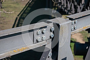 Steel structure with beams and bolts, truss beam. photo