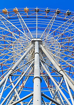 Steel structure of ferris with blue sky