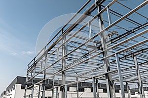 Steel structure workshop with sunny sky