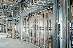 Steel stud construction with plumbing in a modern office building