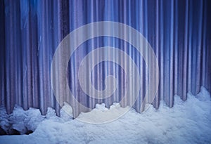 Steel surface covered with snow texture background
