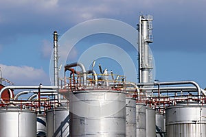 Steel tanks and pipe in oil refinery