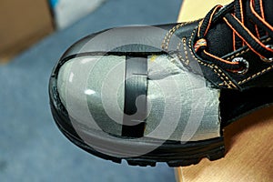 Steel toe cap is a steel plate on the toe of safety shoes