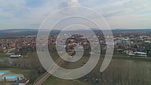 Steel traffic bridge over a river in Europe town Aerial Drone shot