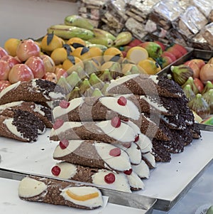 Steel tray containing typical Sicilian sweets.