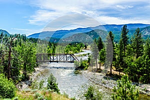 Steel Truss Bridge ove the Nicola River between Merritt and Spences Bridge in British Columbia photo