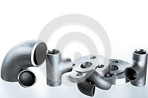 Steel welding fittings and connectors. Elbow, flanges and tee.
