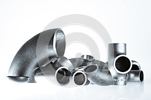 Steel welding fittings and connectors. Elbow, flanges and tee.