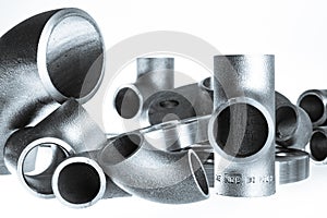 Steel welding fittings and connectors. Elbow, flanges and tee.