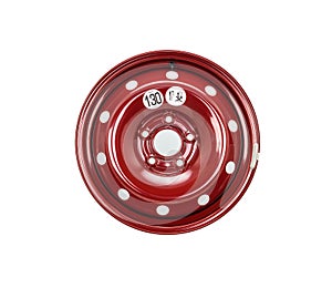 Steel wheel rim close up in red color. Isolated on a white background with a clipping path.