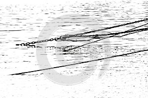 Steel wire cable and iron chain in water in black and white