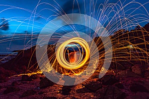 steel wool fire work on the rock