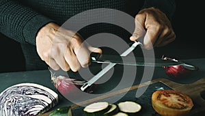 steeling a kitchen knife, banner format