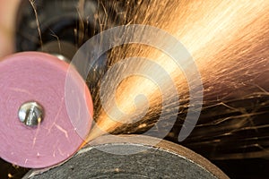 Steels grinding using abrasive tool photo
