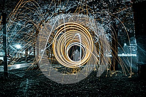 Steelwool photography in the park at rainy night