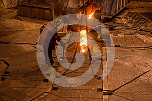 Steelworker near a blast furnace