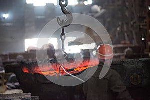 Steelworker at work at a steel mill